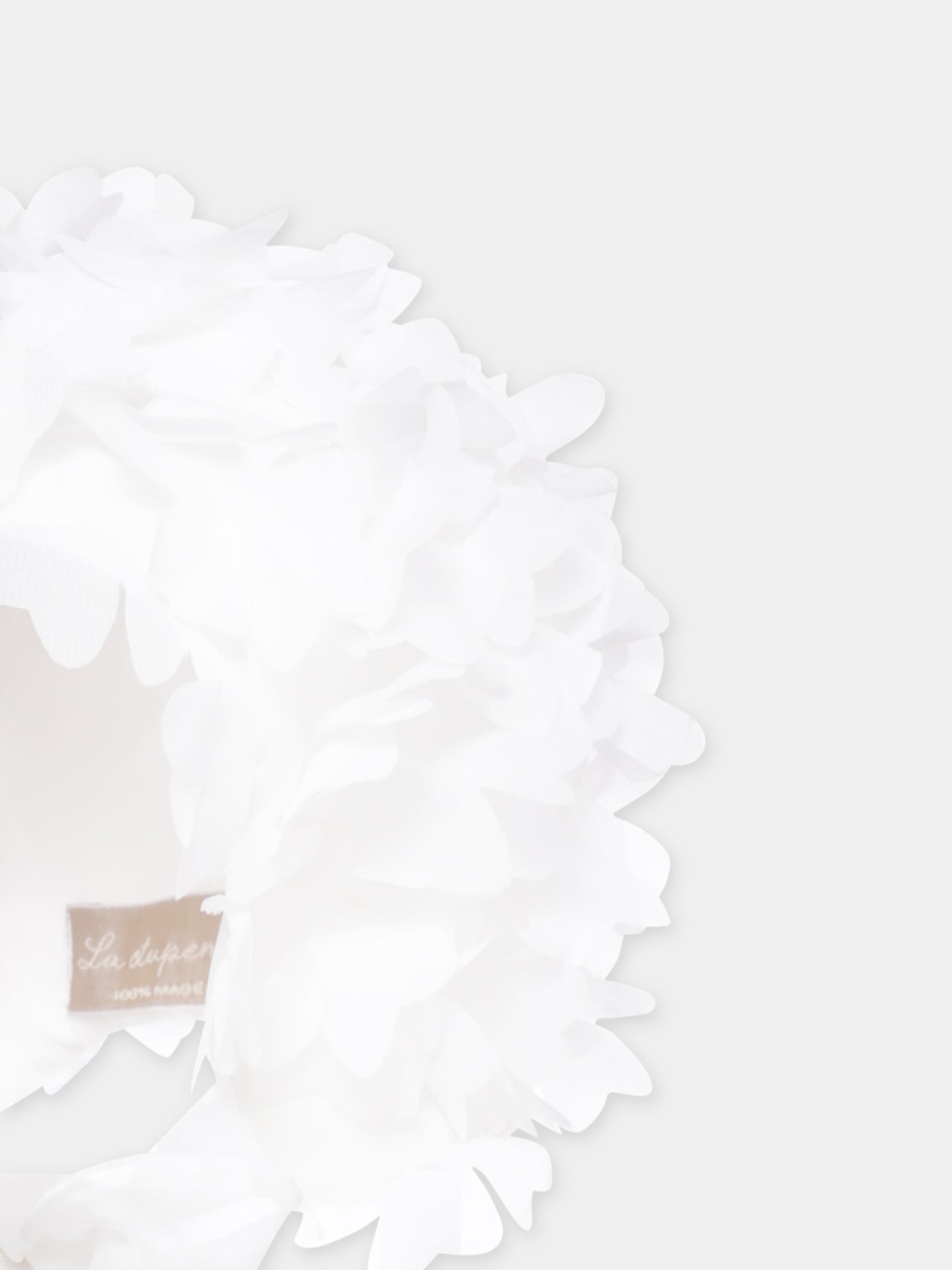 Cuffia bianca per neonata con petali