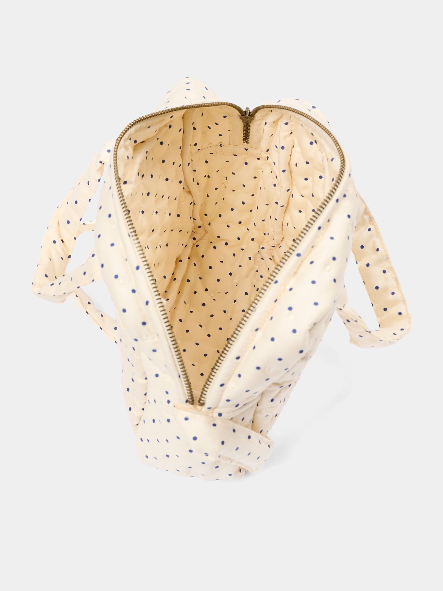 Borsa giochi sensoriali avorio per bambina a pois