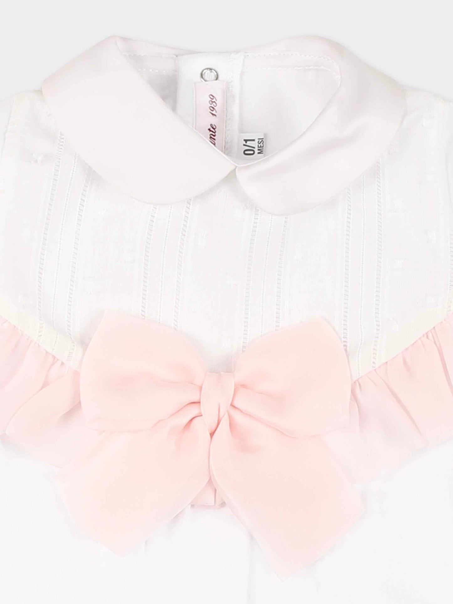 Tutina bianca per neonata con fiocco