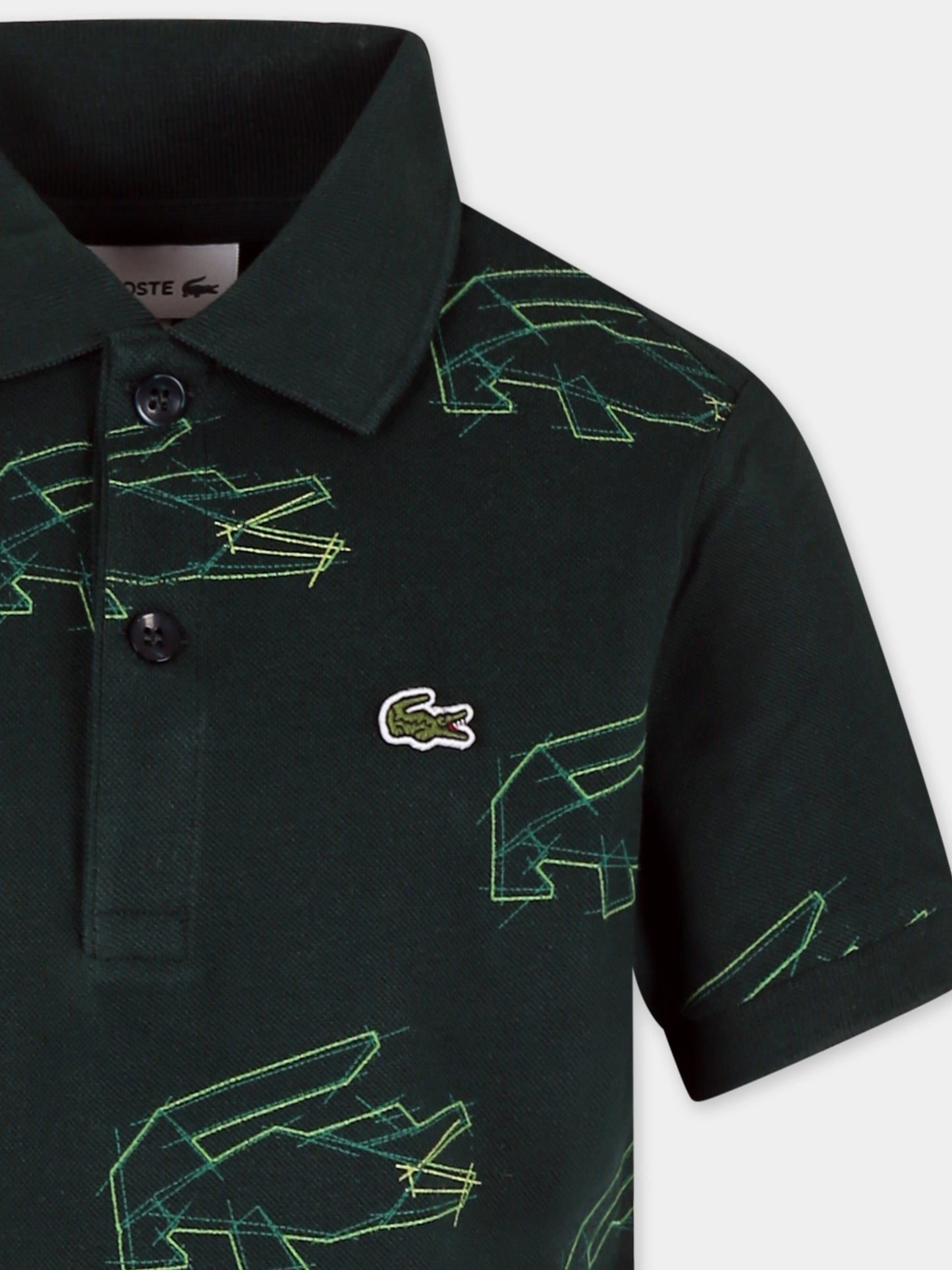 Polo verde per bambini con coccodrillo all over