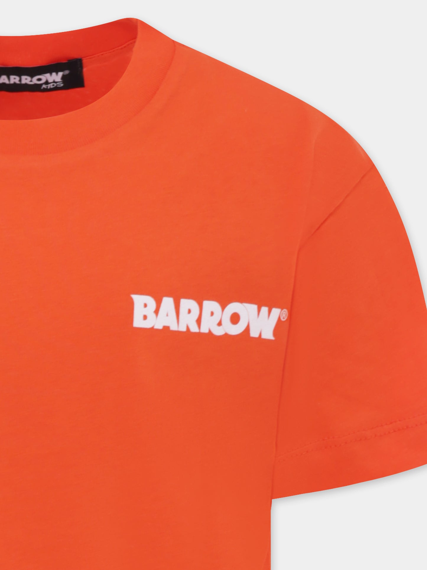 T-shirt arancione per bambini con smile e palma