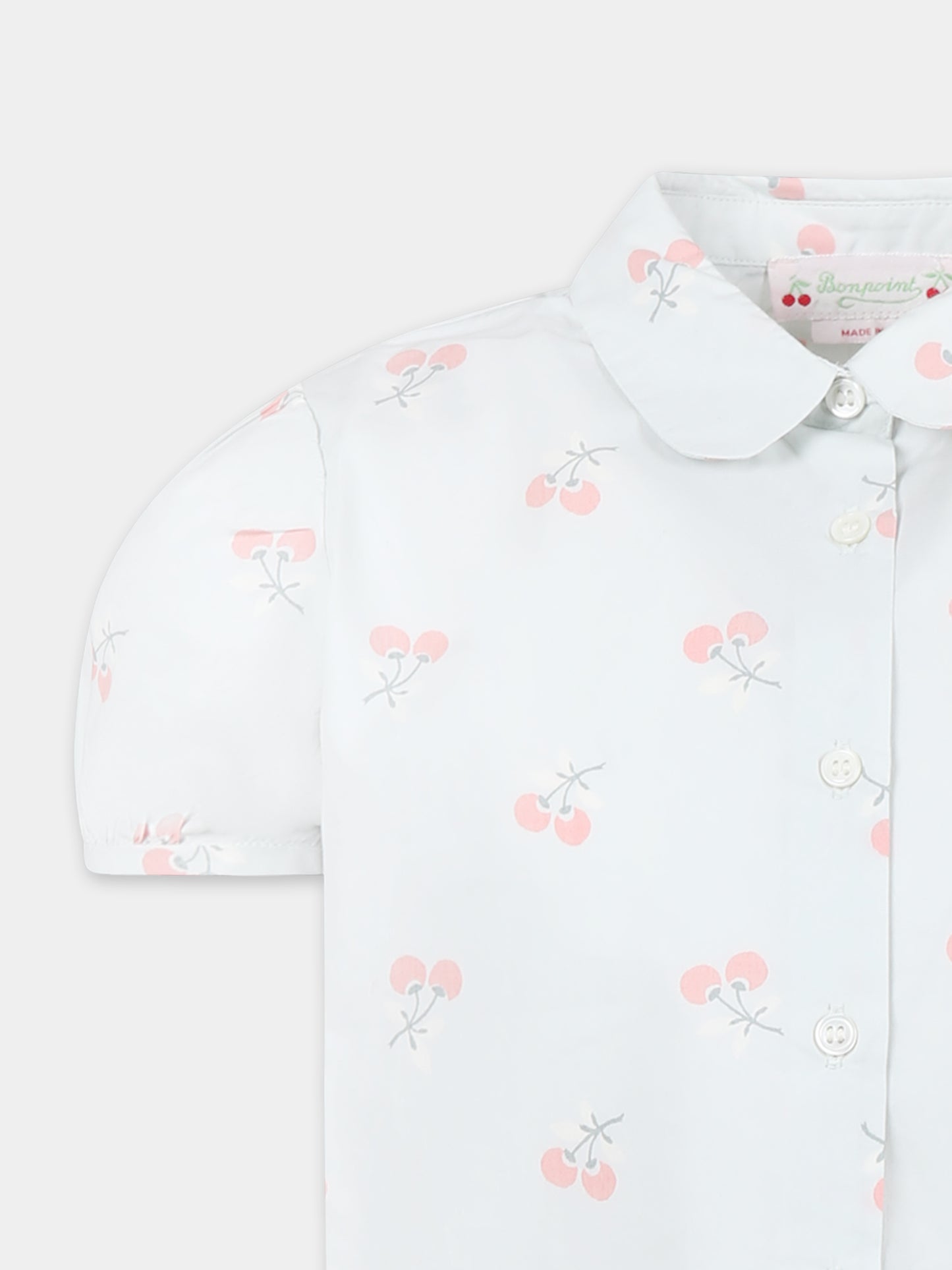 Camicia celeste per bambina con ciliegie all over