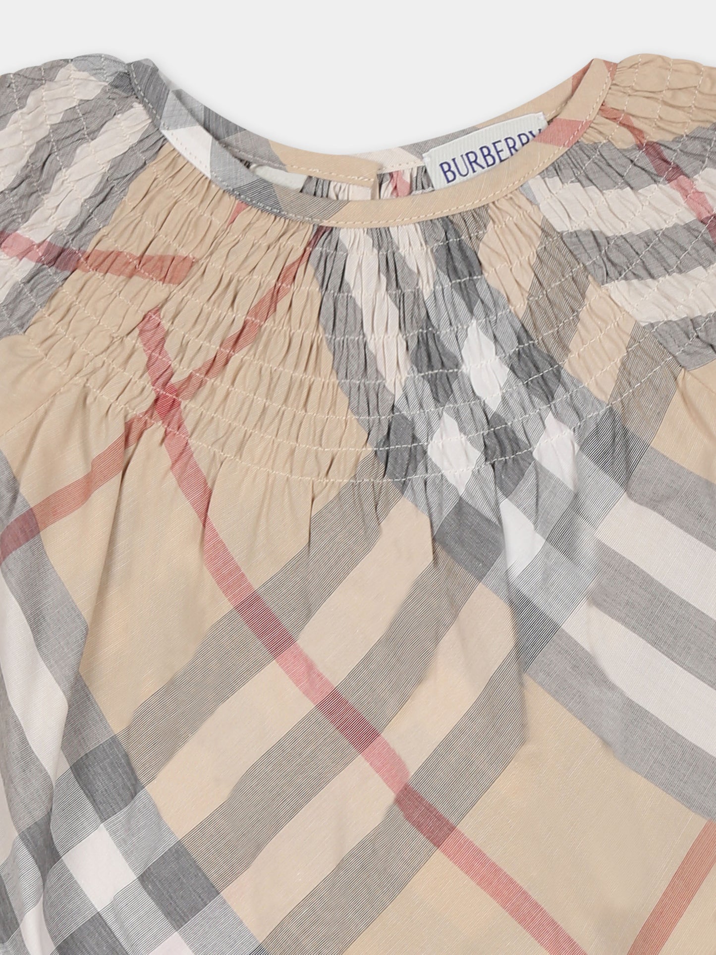 Top beige per neonata con check vintage