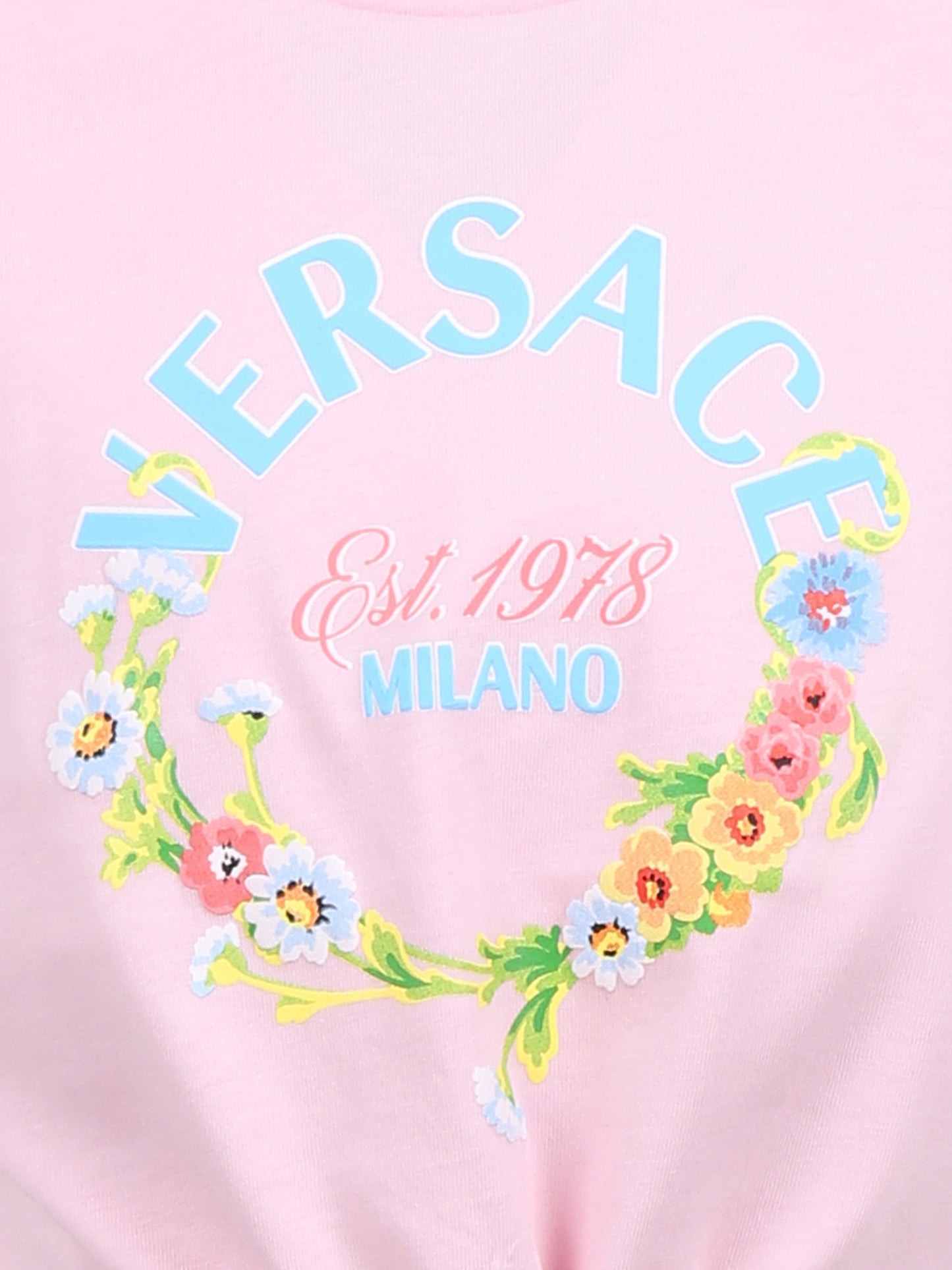 T-shirt crop rosa per bambina con logo floreale