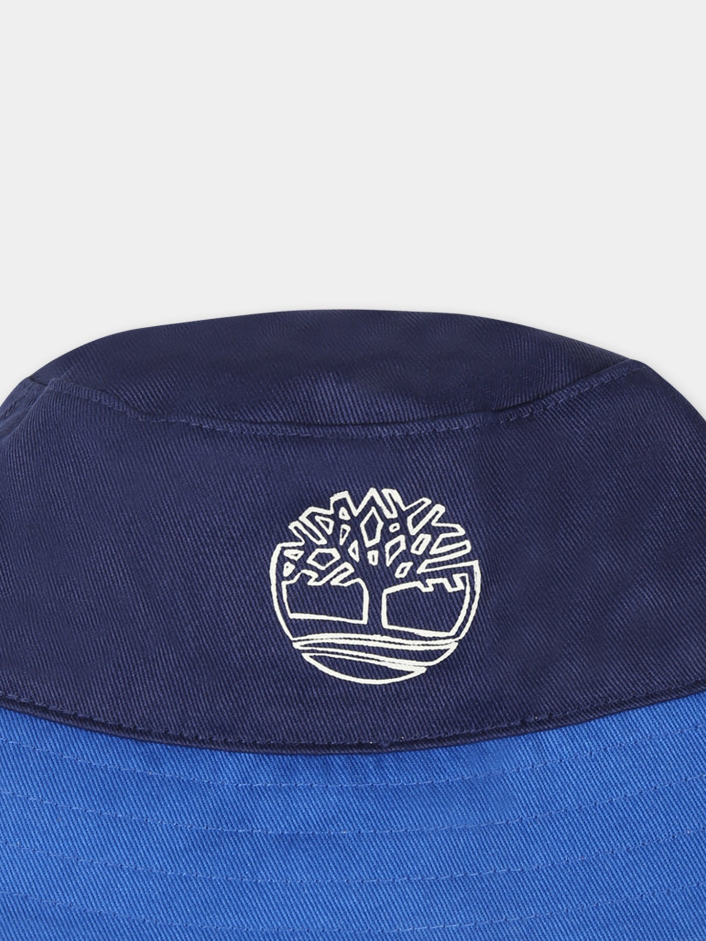 Cloche blu reversibile per neonato con logo e stampa