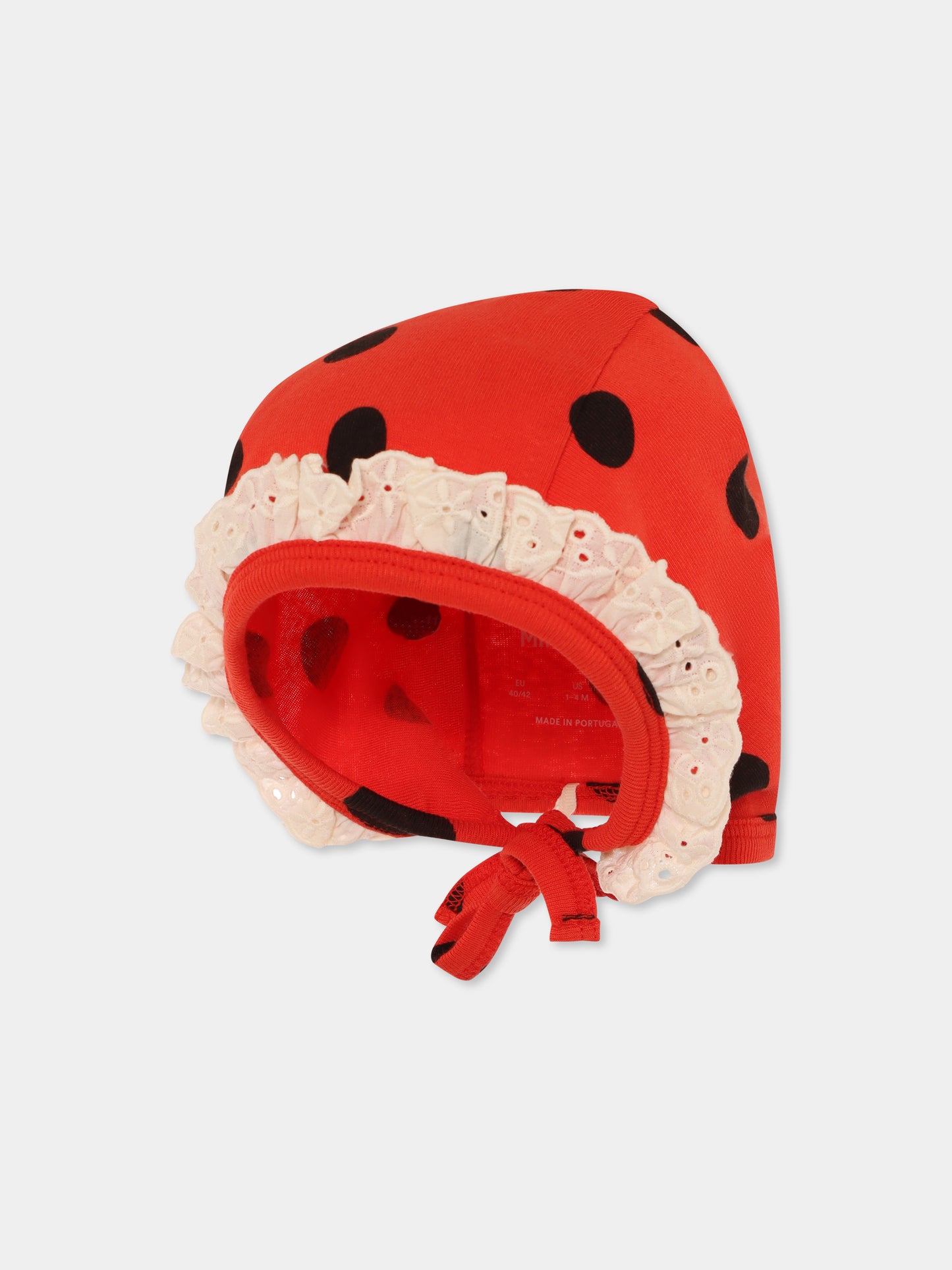 Cuffia rossa per neonata con pois
