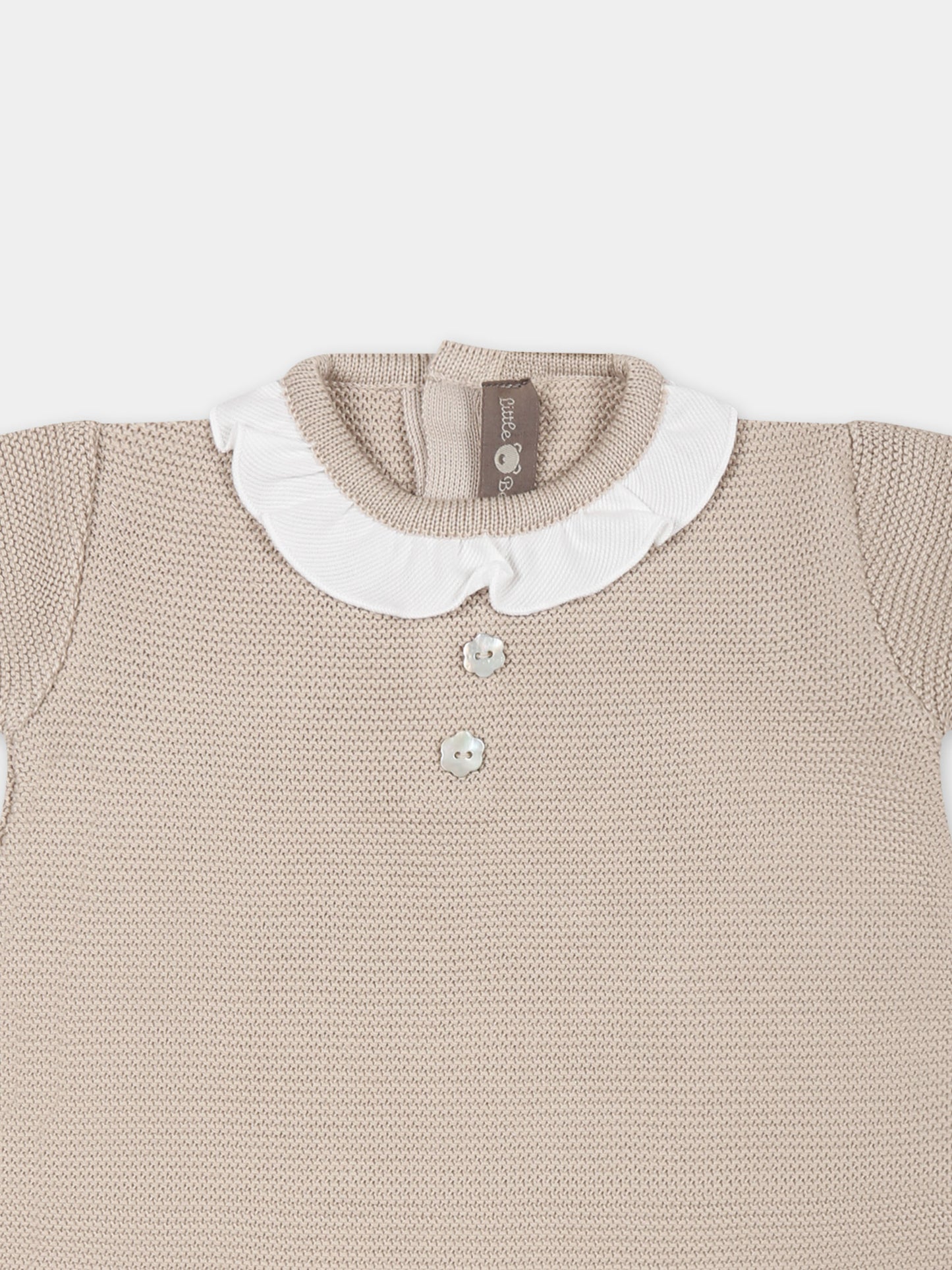 Pagliaccetto beige per neonata