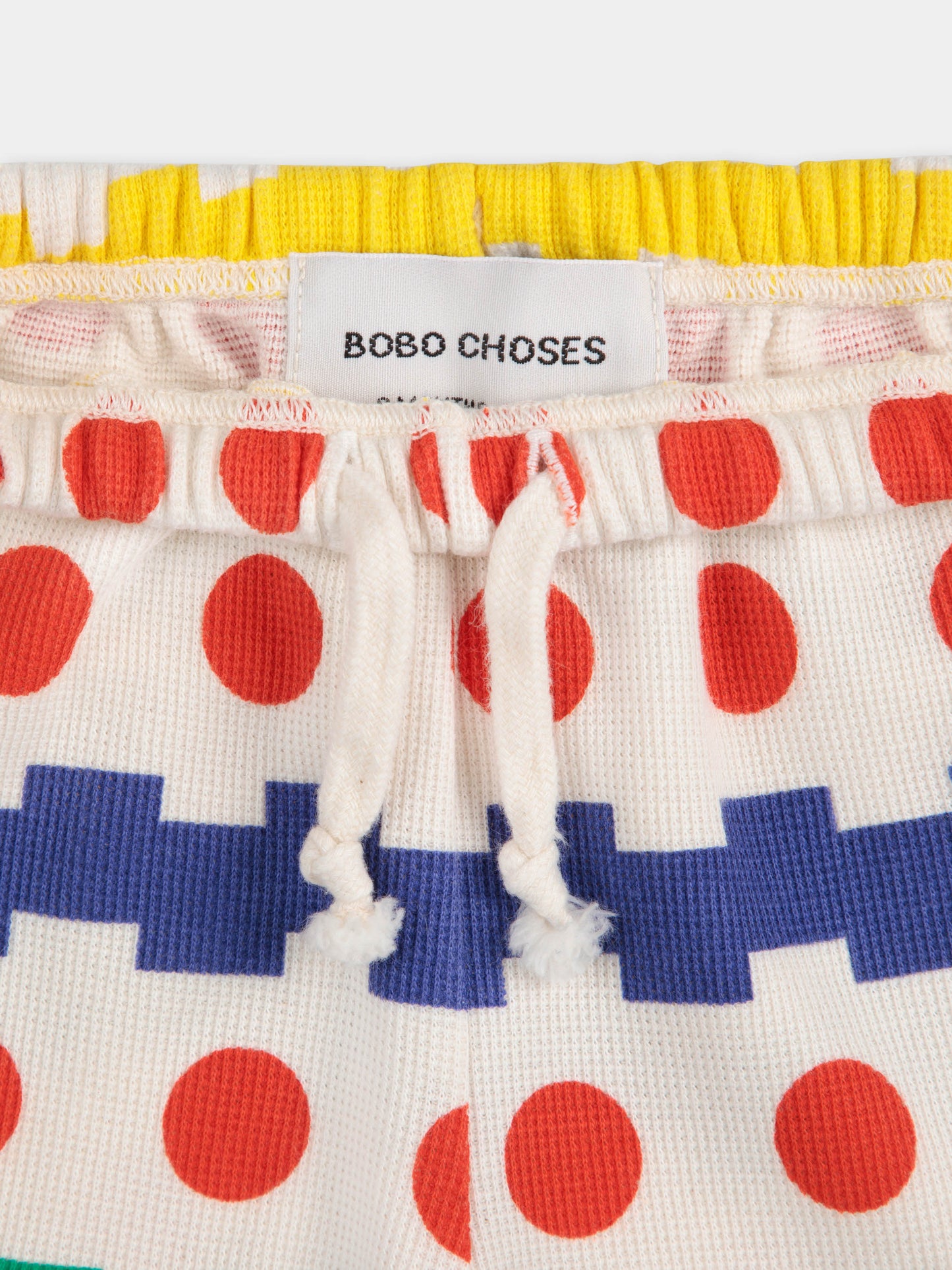 Pantaloni bianchi per neonati con stampa geometrica all over