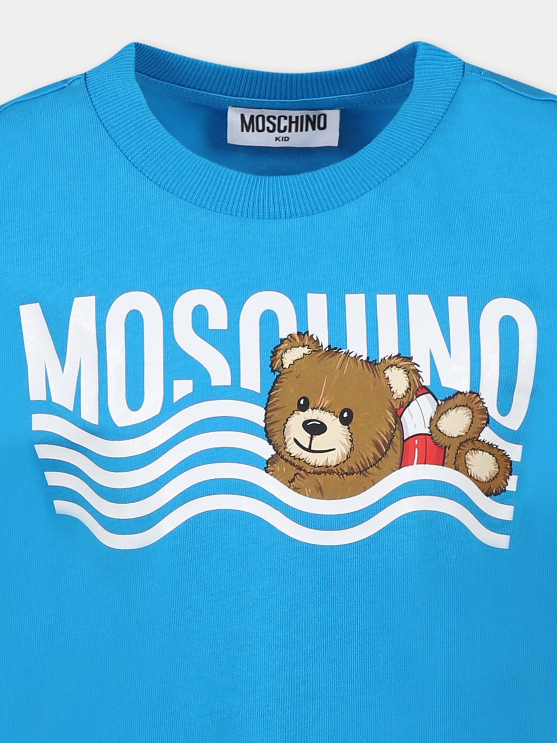 T-shirt azzurra per bambino con Teddy Bear e stampa spiaggia,Moschino Kids,HYM04K LAA24 41047