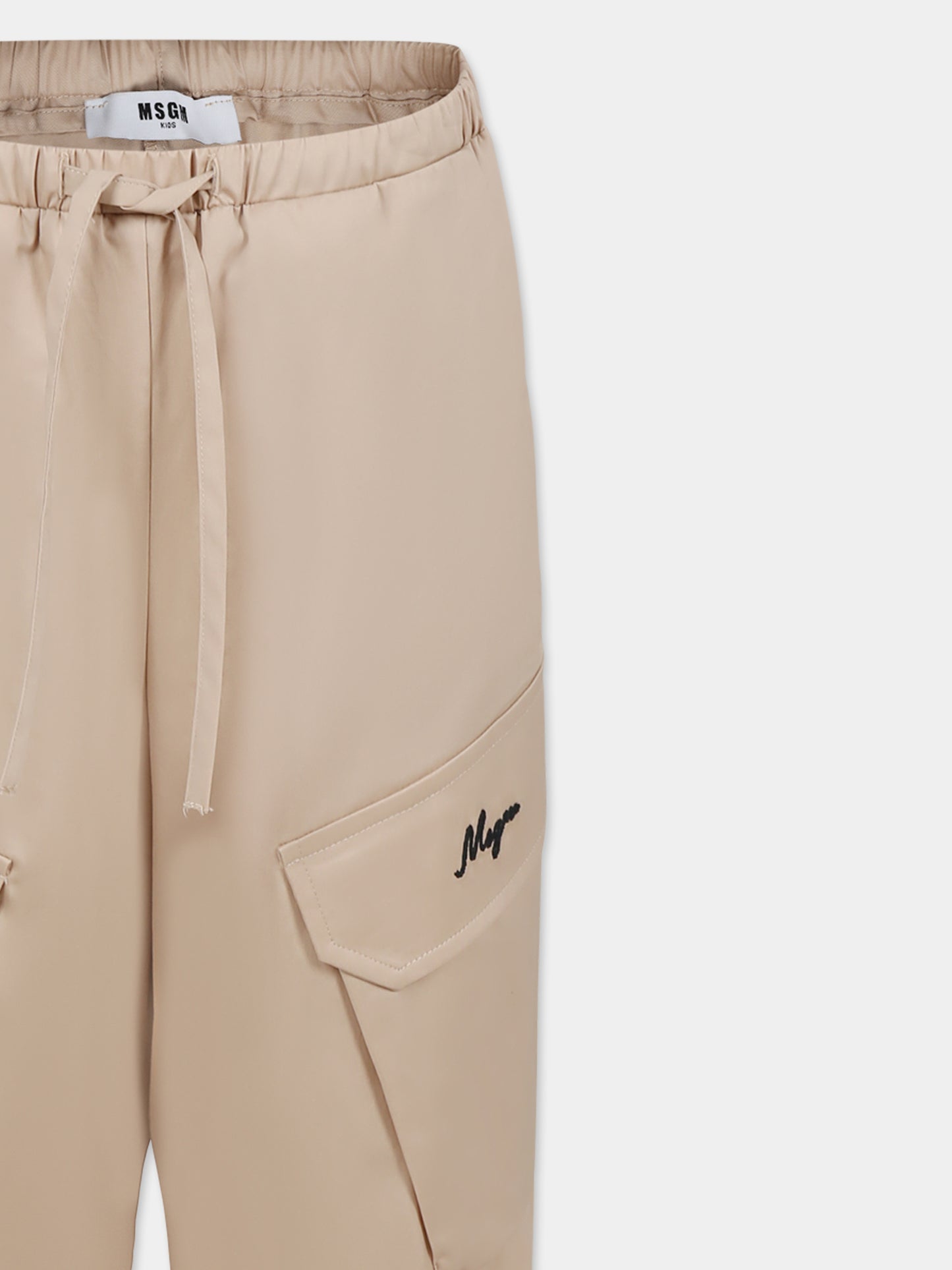 Pantaloni beige per bambina con logo