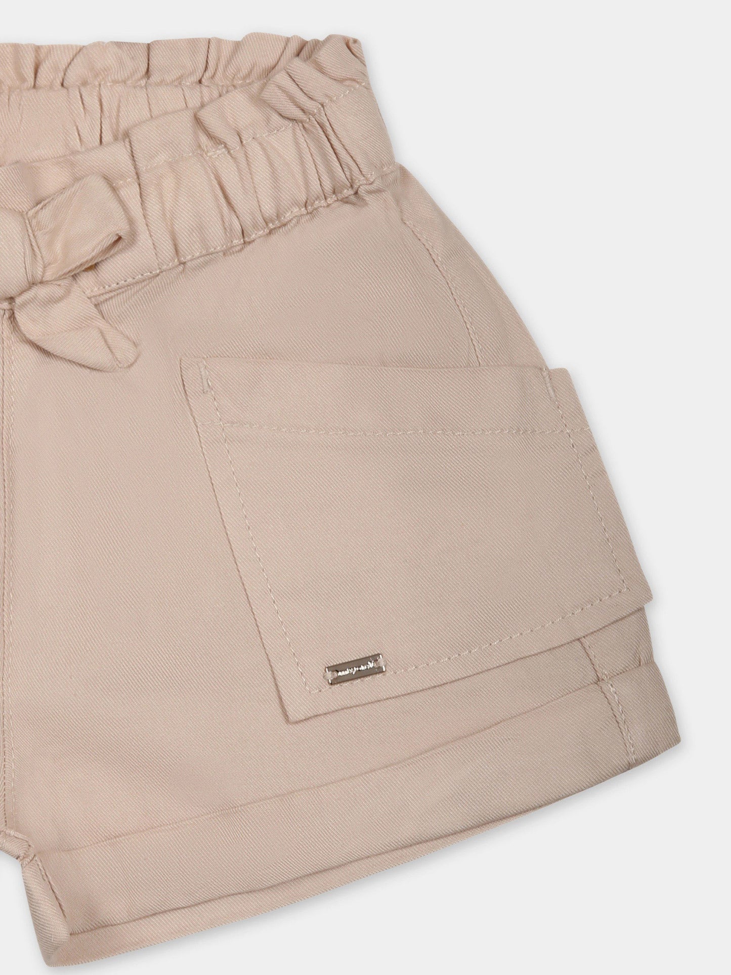Shorts beige per neonata con patch logato
