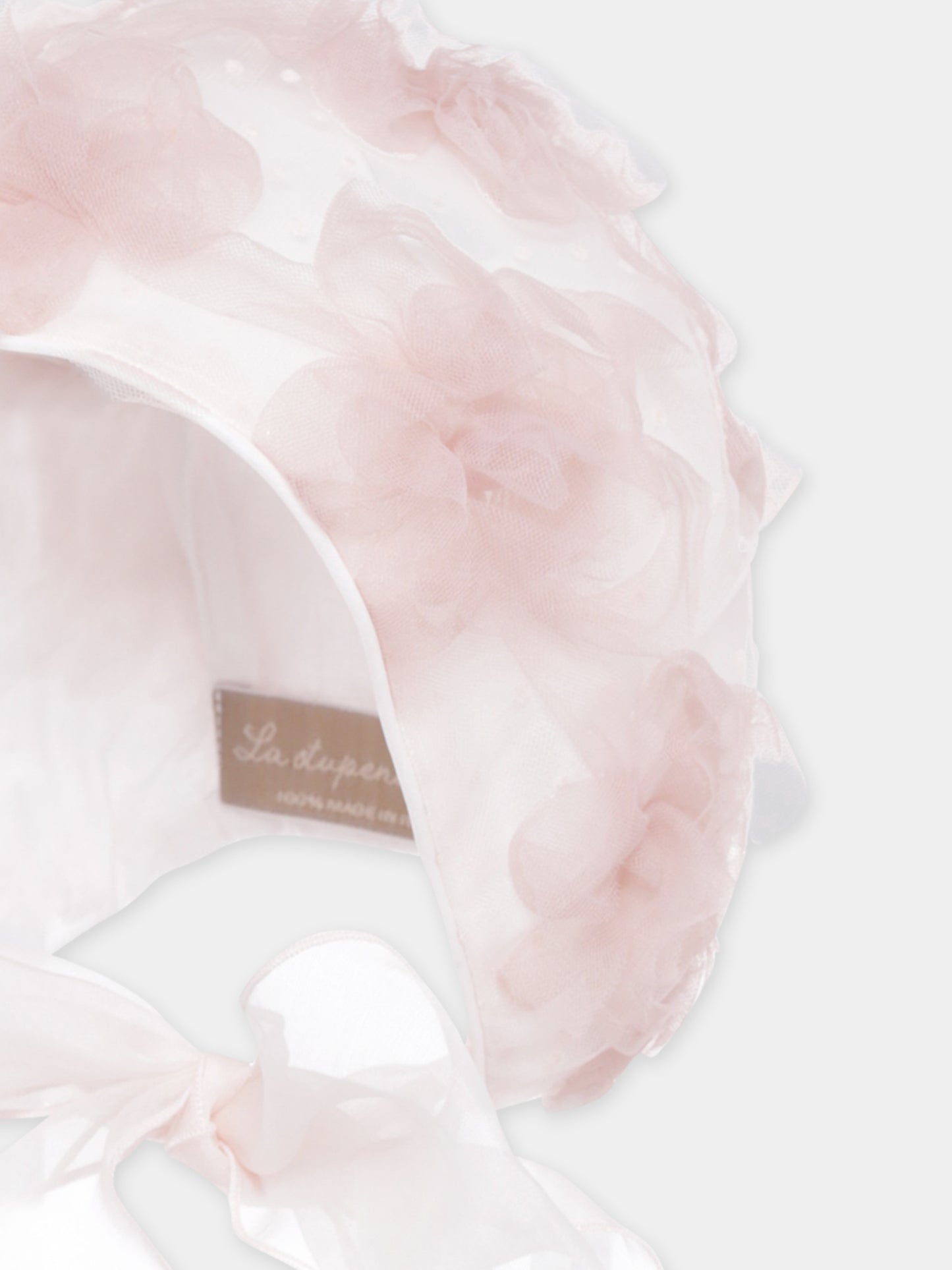 Cuffia rosa per neonata con fiori