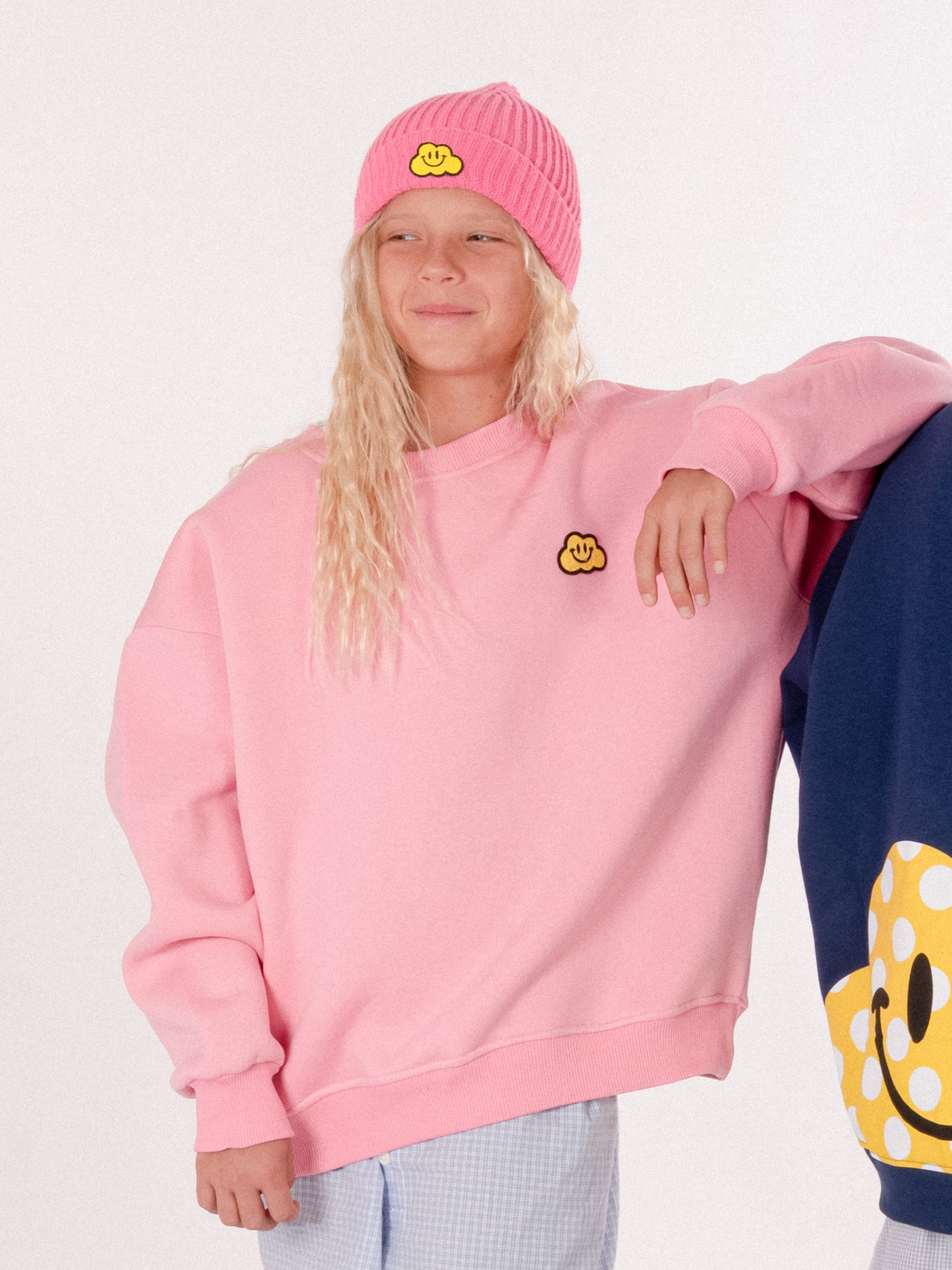 Berretto fucsia per bambini con nuvola gialla